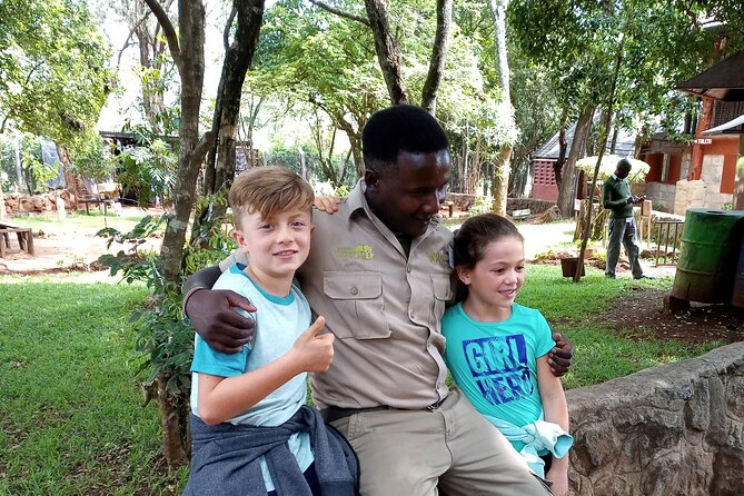A Day Tour to Giraffe Center in Nairobi Kenya - Water, gratuities, and other extra costs