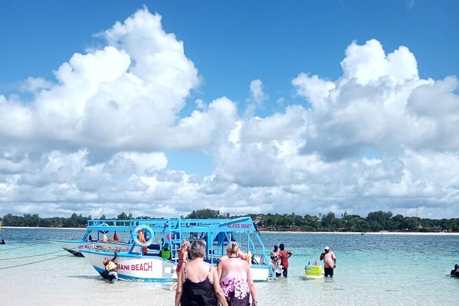Diani Beach: Glass-bottom Boat Ride with Underwater Show - Climbing upstairs for Diani Beach views