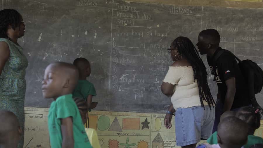 Diani Beach: Village tour on a bike with hotel pick-up - A public primary school and a thoughtful way to help