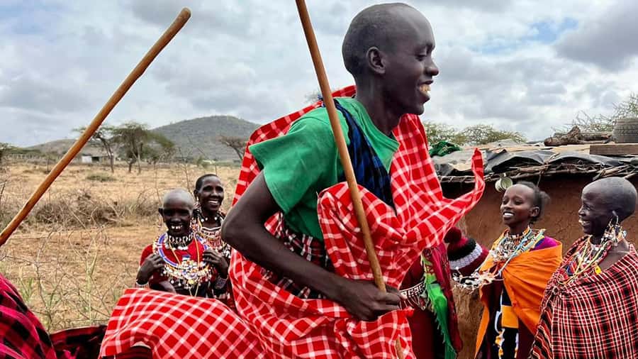 From Nairobi: Maasai Village Experience Day Tour - Cooking ugali inside a manyatta