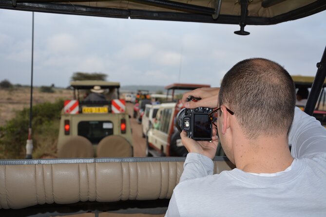 Half-Day Nairobi National Park and Maasai Market with Pick up - Pickup, communication, and a caution about scheduling