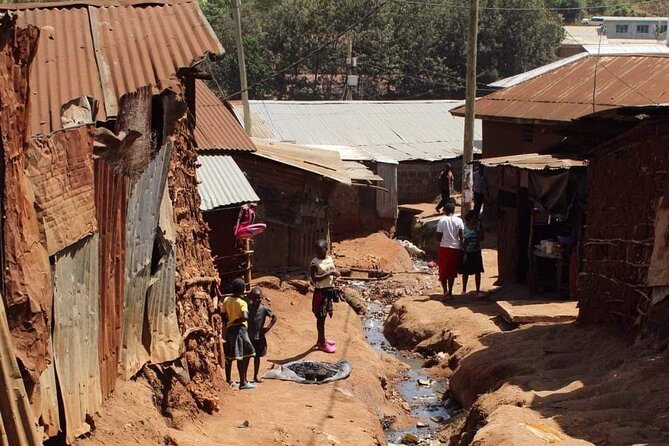 Kibera Chocolate City Tour - Walking beside the historic railway