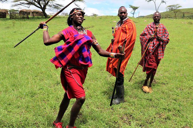 Maasai Magic - A Day Which You Will Never Forget - Song, shuka cloth, and manyatta building