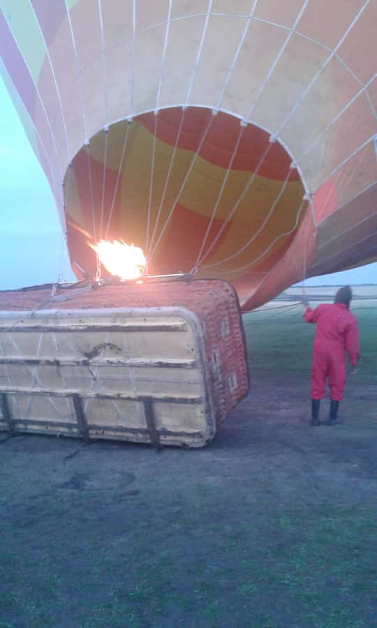 Maasai Mara: Hot Air Balloon Safari & Champagne Breakfast - Watching the balloon fill beneath the first pink light