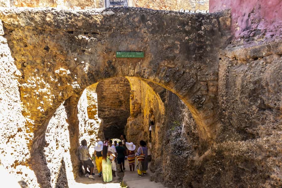 Mombasa City Tour: Fort Jesus Museum, Old Town & Haller Park - Old Town streets, shops, and Swahili food