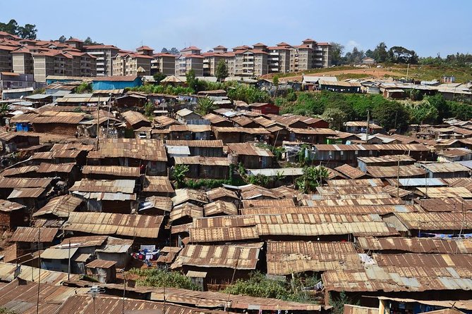 Nairobi Guided Tour to Kibera Slums - Entering a typical Kibera house
