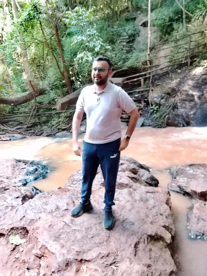 Nairobi: Karura Forest Guided Walking Tour - Waterfall mist, streams, and rustic bridges