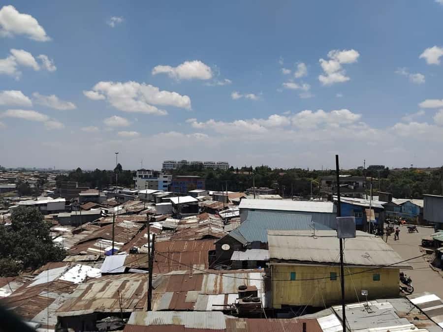 Nairobi: Kibera Slum Half-Day Guided Tour With Pick-up - Tasting local snacks and visiting the food market