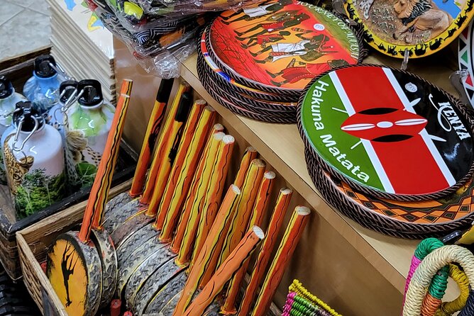 Souvenir Crafts, Fabric Shopping & Hair Braiding & City Tour - Ankara fabric, clothing, and the chance to order a custom outfit